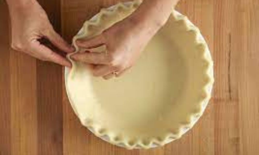 How do you fluet your pie crust?